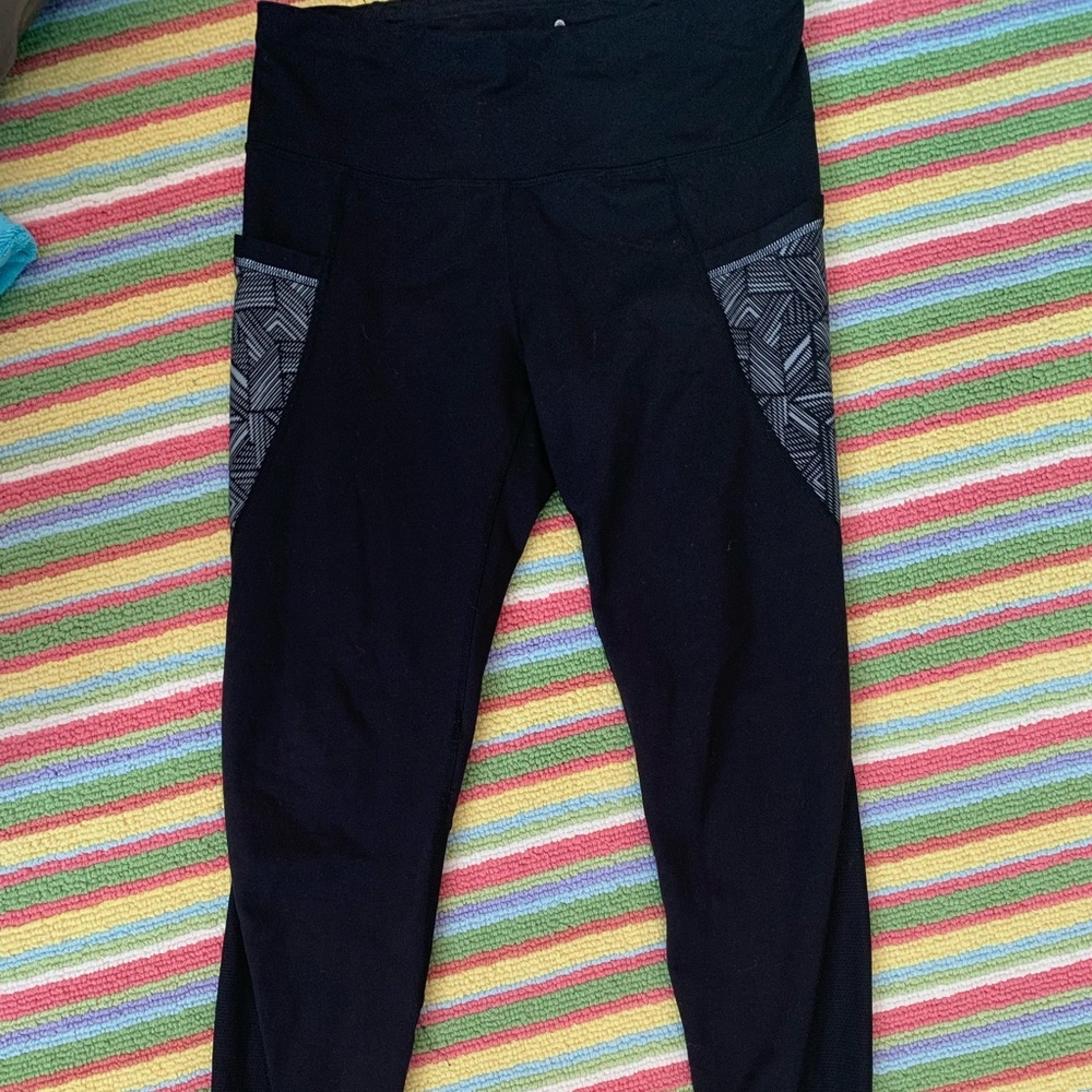 Athleta leggings with detailing and pockets